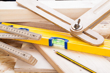 Image showing Carpenters level, ruler and right angle
