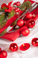 Image showing Red themed Christmas place setting