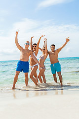 Image showing young happy friends havin fun on the beach