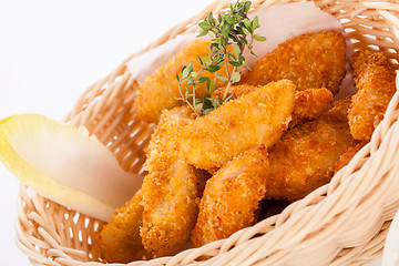 Image showing Crumbed chicken nuggets in a basket