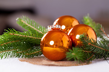 Image showing Shiny bright copper colored Christmas balls