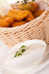 Image showing Crumbed chicken nuggets in a basket