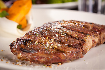 Image showing Grilled beef steak with seasoning