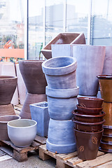 Image showing Glazed and unglazed ceramic flower pots