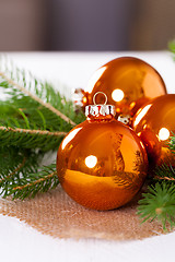 Image showing Shiny bright copper colored Christmas balls