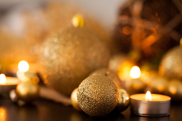 Image showing Warm gold and red Christmas candlelight background