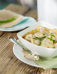 Image showing Dish of savory pork tortellini in broth pelmeni russian