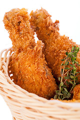 Image showing Crisp crunchy golden chicken legs and wings