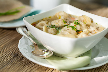 Image showing Dish of savory pork tortellini in broth pelmeni russian