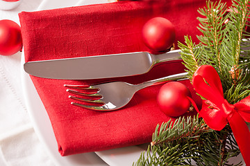 Image showing Red themed Christmas place setting