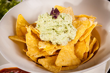 Image showing Crisp corn nachos with guacamole sauce