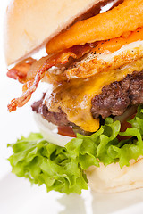 Image showing Delicious egg and bacon cheeseburger