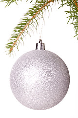 Image showing Christmas ball hanging from a branch of a fir tree