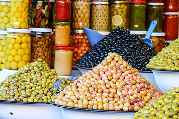 Image showing Olives and pickles on display at a farmers market