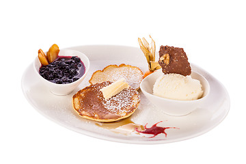 Image showing tasty sweet pancakes with vanilla icecream and topping