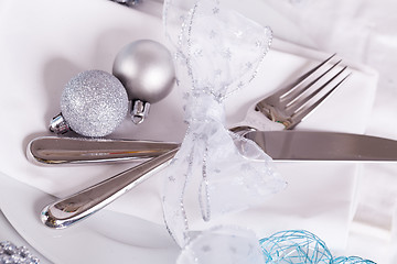 Image showing Stylish blue and silver Christmas table setting