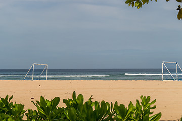 Image showing Beautiful tropical beach with lush vegetation