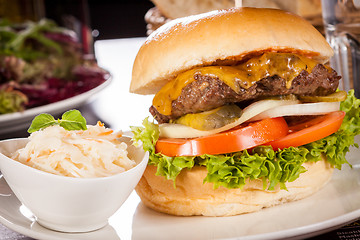 Image showing Cheeseburger with cole slaw 