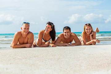 Image showing young happy friends havin fun on the beach