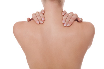 Image showing Woman caressing her bare shoulder and back