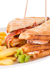 Image showing Club sandwich with potato French fries