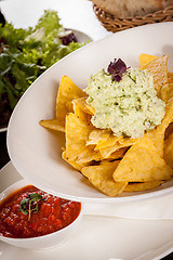 Image showing Crisp corn nachos with guacamole sauce