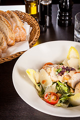 Image showing tasty fresh caesar salad with grilled chicken and parmesan 