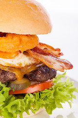 Image showing Delicious egg and bacon cheeseburger