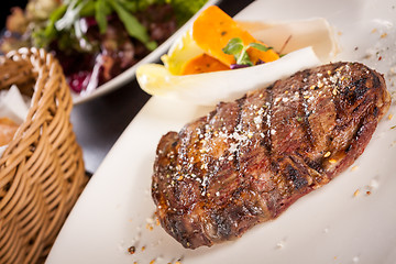 Image showing Grilled beef steak with seasoning