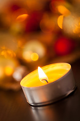 Image showing Warm gold and red Christmas candlelight background