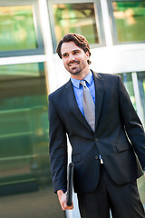 Image showing Businessman standing waiting for someone