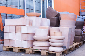 Image showing Glazed and unglazed ceramic flower pots