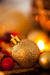 Image showing Warm gold and red Christmas candlelight background