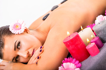 Image showing young attractive woman hot stone massage wellness