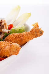 Image showing Platter of mixed meats, salad and French fries