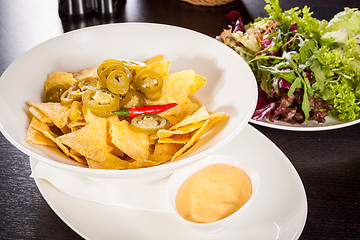 Image showing Nachos with cheese sauce and chilli pepperoni