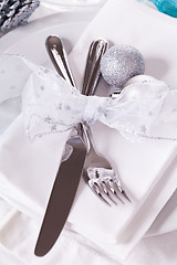 Image showing Stylish blue and silver Christmas table setting