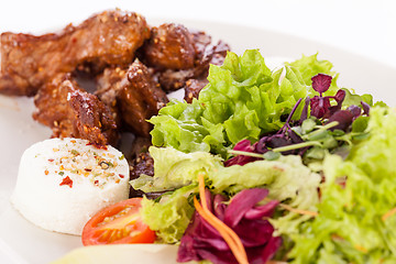 Image showing grilled beef stripes fresh salad and goat cheese