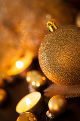 Image showing Warm gold and red Christmas candlelight background