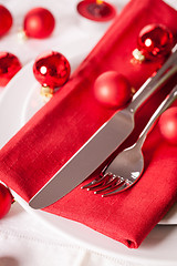 Image showing Red themed Christmas place setting