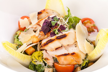 Image showing tasty fresh caesar salad with grilled chicken and parmesan 