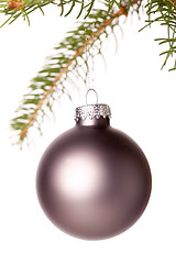 Image showing Christmas ball hanging from a branch of a fir tree