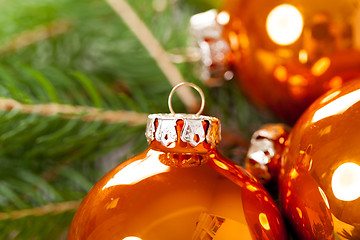 Image showing Shiny bright copper colored Christmas balls