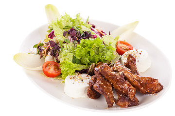 Image showing grilled beef stripes fresh salad and goat cheese