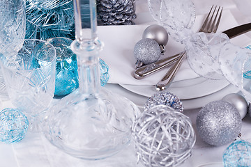 Image showing Stylish blue and silver Christmas table setting