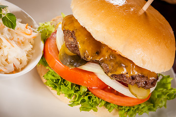 Image showing Cheeseburger with cole slaw 