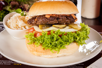 Image showing Cheeseburger with cole slaw 