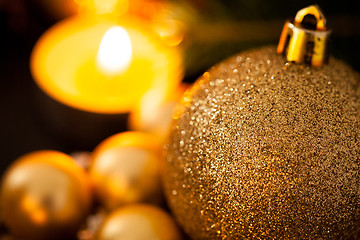 Image showing Warm gold and red Christmas candlelight background