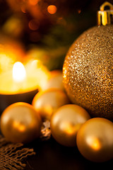 Image showing Warm gold and red Christmas candlelight background