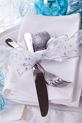 Image showing Stylish blue and silver Christmas table setting